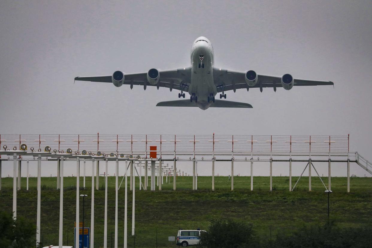 25 September 2020, Saxony, Dresden: A frontal view of an Airbus A380 shortly after take-off flies over a lighting system at Dresden Airport. Photo: Tino Plunert/dpa-Zentralbild/ZB (Photo by Tino Plunert/picture alliance via Getty Images)