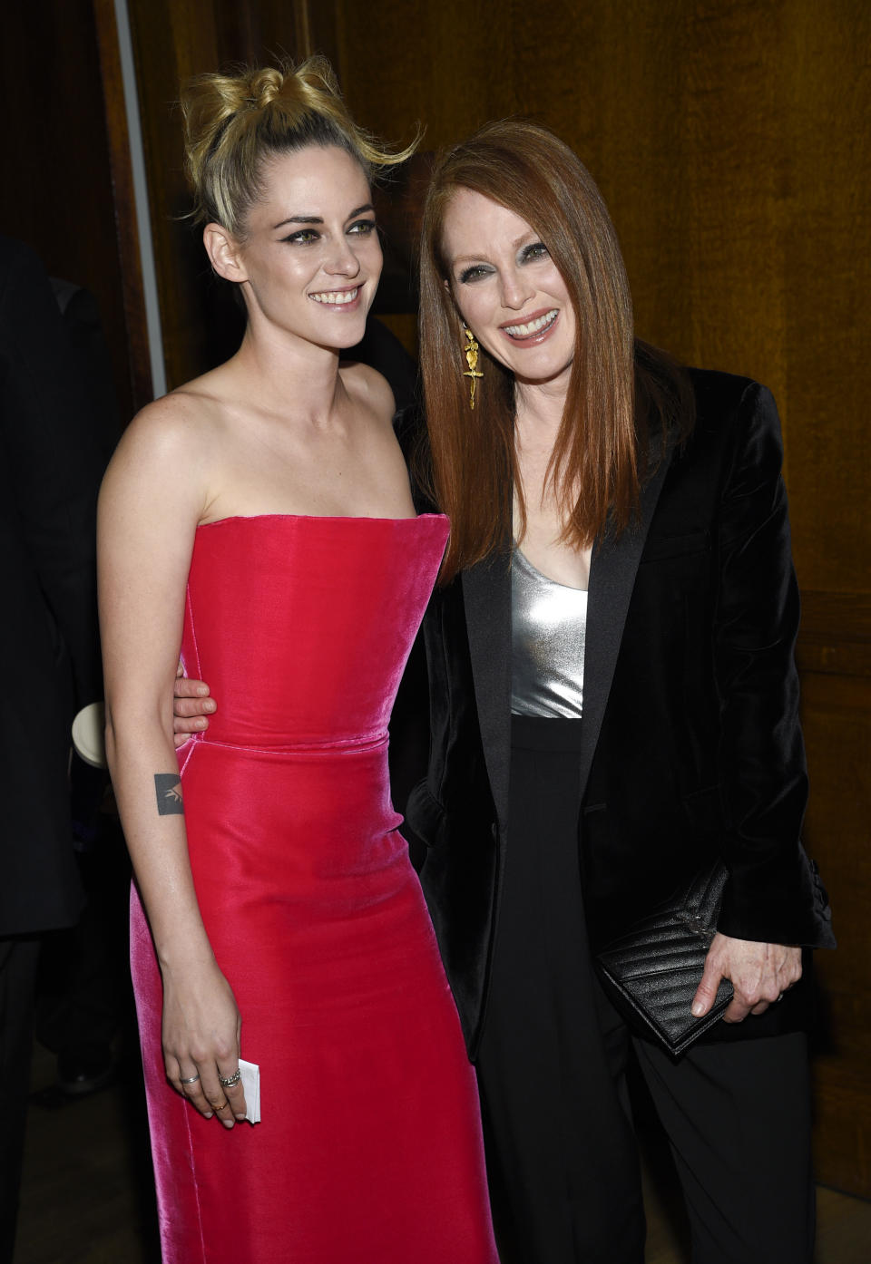 Kristen Stewart, left, poses with Julianne Moore in the winners room at the Gotham Awards at Cipriani Wall Street on Monday, Nov. 29, 2021, in New York. (Photo by Evan Agostini/Invision/AP)