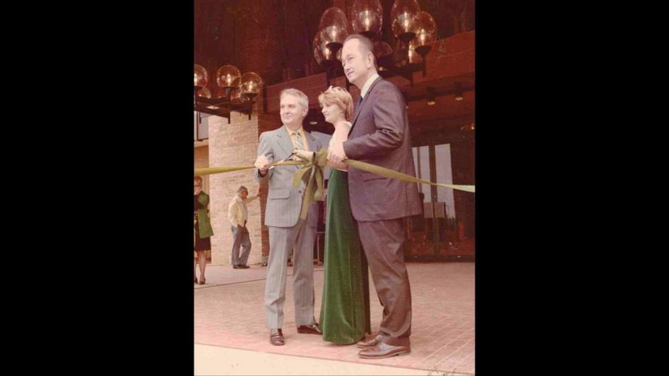 May Stores official George J. Weitkamp, Miss Fairview Heights Debbie Braden and Fairview Heights Mayor Everett Moody at the grand opening of St. Clair Square in October 1974. Courtesy of St. Clair Square