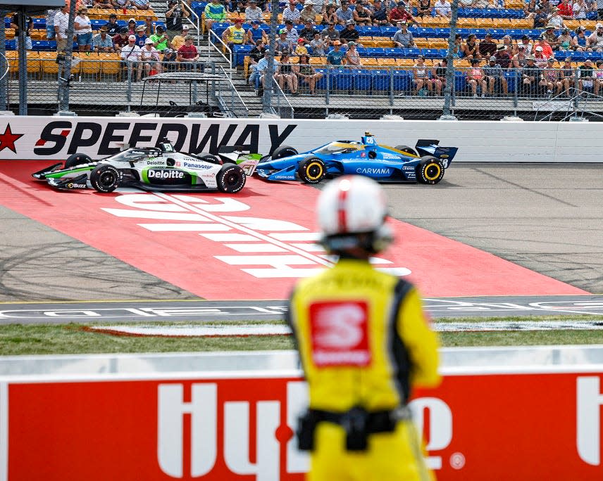 Race team members worked hard to stay cool and get their respective teams in contention to win the IndyCar Hy-VeeDeals.com 250 at the Iowa Speedway in 2022.