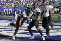 Atlanta Falcons tight end Lee Smith (85) celebrates with his teammates after catching a touchdown pass during the second half of an NFL football game against the New York Giants, Sunday, Sept. 26, 2021, in East Rutherford, N.J. (AP Photo/Bill Kostroun)