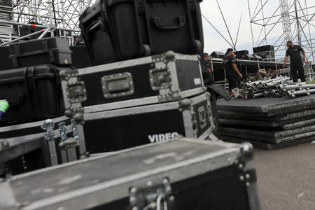 Equipment crates are seen as workers set up a platform for the upcoming concert "Venezuela Aid Live" at Tienditas cross-border bridge between Colombia and Venezuela in Cucuta, Colombia February 20, 2019. REUTERS/Luisa Gonzalez