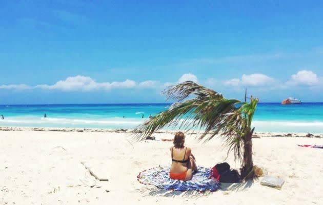 Travel writer Erin on the beach at Playa Del