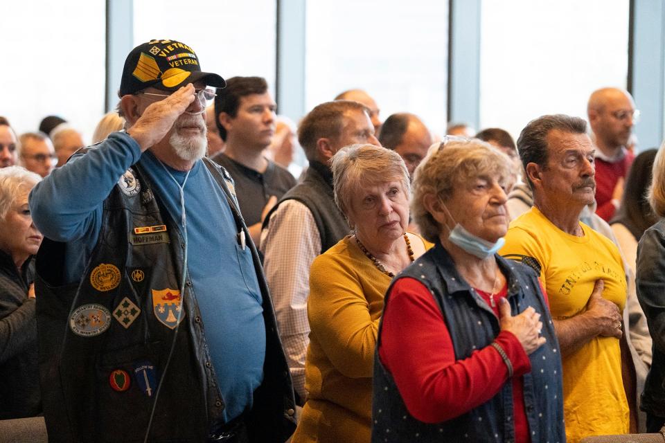 Vietnam War veteran Richard Hoffman, 74, a resident of Columbus' Hilltop, salutes the flag Friday, Nov. 11, 2022 during the annual Veterans Day ceremony at the National Veterans Memorial and Museum in Columbus.