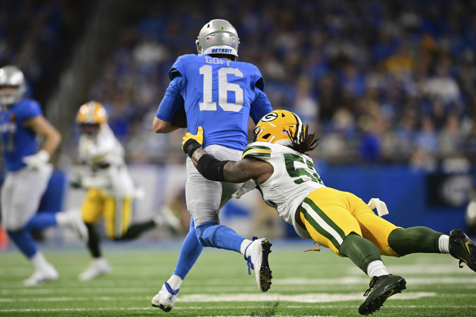 Detroit Lions quarterback Jared Goff (16) is sacked by Green Bay Packers linebacker Rashan Gary during the first half of an NFL football game, Thursday, Nov. 23, 2023, in Detroit. (AP Photo/David Dermer)