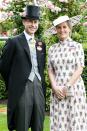<p>Sophie, Countess of Wessex posed for photographs with Prince Edward ahead of their 20th wedding anniversary. Sophie chose a pale pink dress with a floral pattern and matching wide-brimmed hat. <br></p>