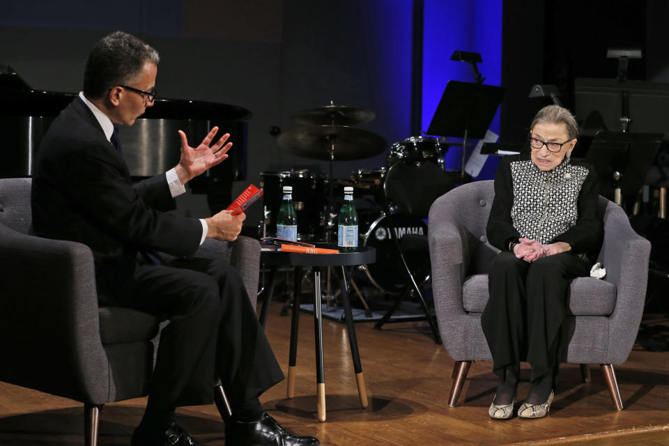 Supreme Court Justice Ruth Bader Ginsburg speaks with author Jeffrey Rosen, left, at the National Constitution Center Americas Town Hall at the National Museum of Women in the Arts, Tuesday, Dec. 17, 2019, in Washington. (AP Photo/Steve Helber)
