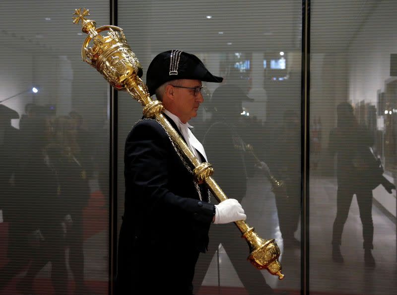 A ceremonial mace arrives at the Senate before the speech from the throne in Ottawa