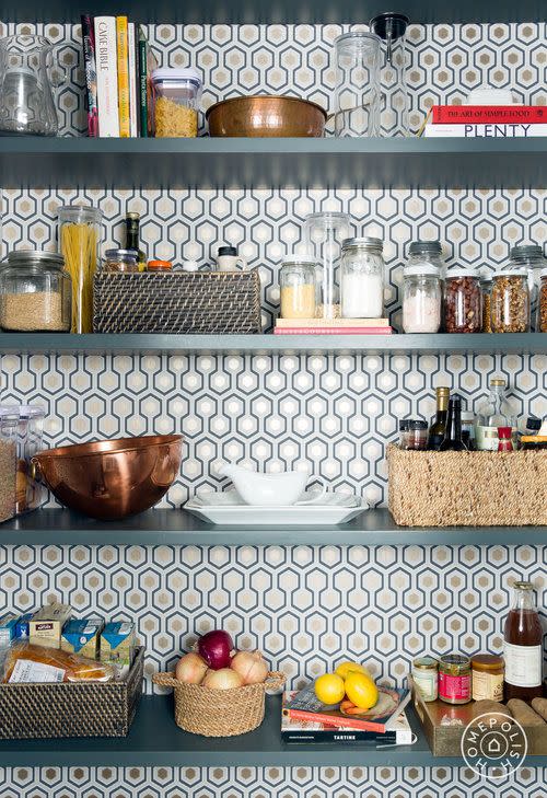 pantry organization ideas, geometric wallpaper in the pantry with baskets of food on the shelves