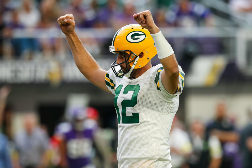 MINNEAPOLIS, MN - SEPTEMBER 11: Aaron Rodgers #12 of the Green Bay Packers celebrates a touchdown against the Minnesota Vikings in the third quarter of the game at U.S. Bank Stadium on September 11, 2022 in Minneapolis, Minnesota. The Vikings defeated the Packers 23-7. (Photo by David Berding/Getty Images)