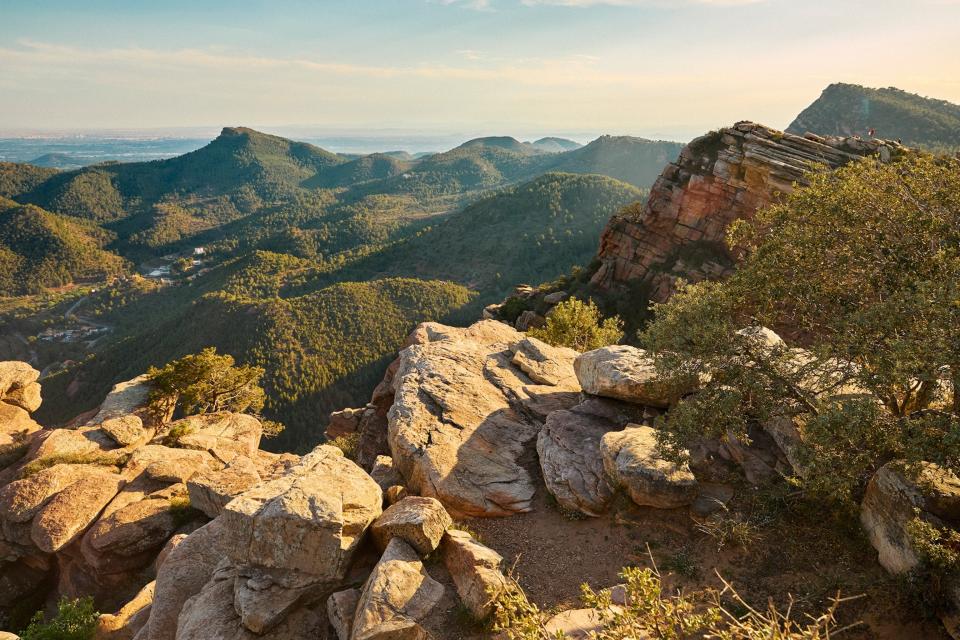 Viewpoint over a parkof mountains and green hills