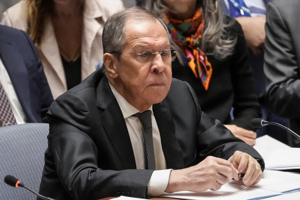 Russia's foreign minister Sergey Lavrov, serving as the president of the Security Council, listens as Antonio Guterres, United Nations Secretary General, left, speaks during a meeting of the U.N. Security Council, Monday, April 24, 2023, at United Nations headquarters. (AP Photo/John Minchillo)