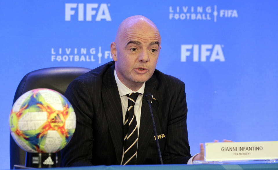 FIFA President Gianni Infantino talks during a press conference after the FIFA Council Meeting, Friday, March 15, 2019, in Miami. The council approved working with Qatar to explore expanding the 2022 World Cup to 48 teams by adding at least one more country in the Persian Gulf to host matches. (AP Photo/Luis M. Alvarez)