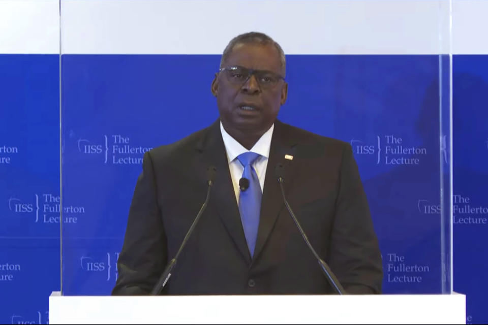 In this image from video provided by IISS, U.S. Defense Secretary Lloyd J. Austin delivers a speech during the 40th IISS Fullerton Lecture Tuesday, July 27, 2021 in Singapore. Austin decried the actions of Myanmar's military rulers as unacceptable on Tuesday, while urging a regional bloc to keep demanding an end to violence. Austin also applauded the Association of Southeast Asian nations for its efforts on the issue, which included forging a consensus with Myanmar’s military leader in April. (IISS via AP)