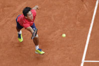 Mackenzie McDonald of the U.S. plays a shot against Spain's Rafael Nadal in the second round match of the French Open tennis tournament at the Roland Garros stadium in Paris, France, Wednesday, Sept. 30, 2020. (AP Photo/Christophe Ena)