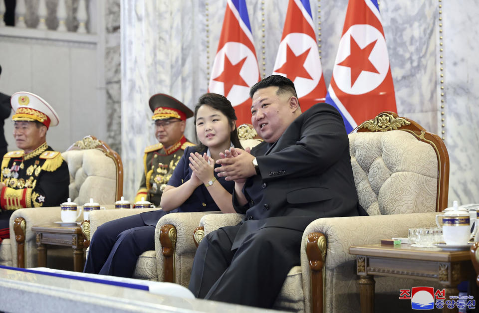 In this photo provided Saturday, Sept. 9, 2023, by the North Korean government, North Korea leader Kim Jong Un, right, with his daughter, left, attends a paramilitary parade ceremony marking North Korea’s 75th founding anniversary in Pyongyang, North Korea, Friday, Sept. 8. Independent journalists were not given access to cover the event depicted in this image distributed by the North Korean government. The content of this image is as provided and cannot be independently verified. Korean language watermark on image as provided by source reads: "KCNA" which is the abbreviation for Korean Central News Agency. (Korean Central News Agency/Korea News Service via AP)