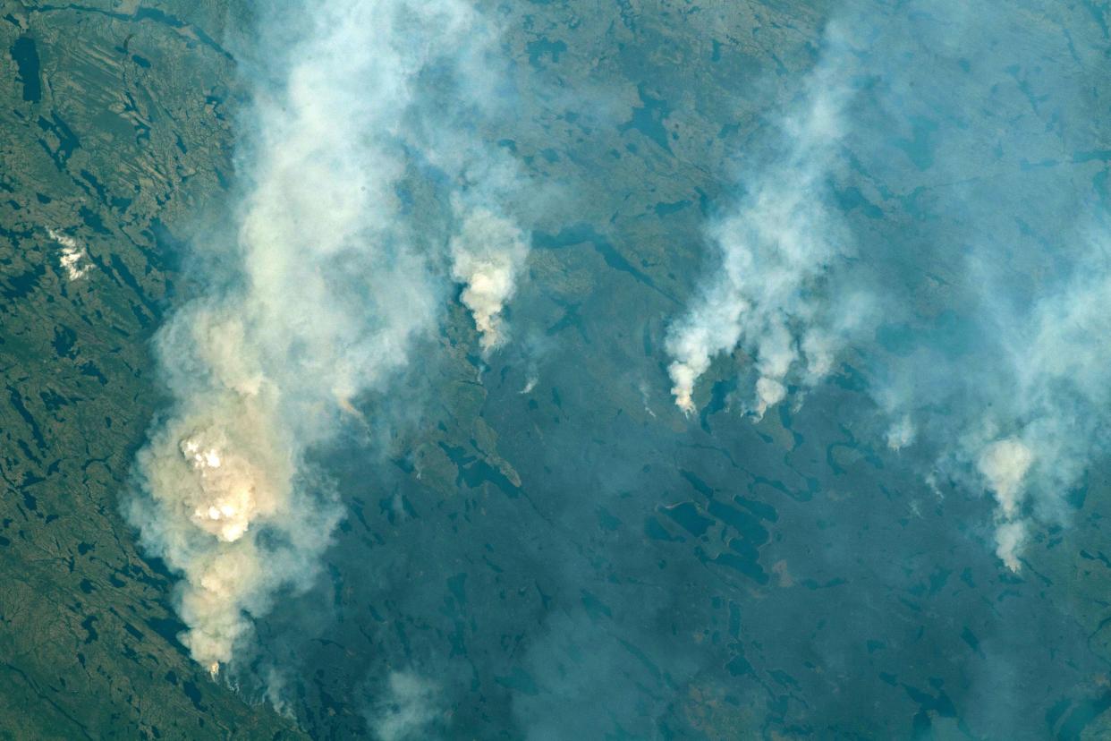 Wildfires in the Canadian province of Quebec in June 2023 are pictured from the International Space Station (Alamy/PA)