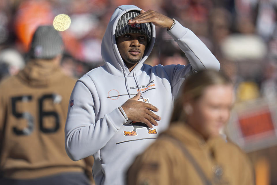 Cleveland Browns quarterback Deshaun Watson watches play from the sidelines during the first half of an NFL football game against the Pittsburgh Steelers, Sunday, Nov. 19, 2023, in Cleveland. (AP Photo/Sue Ogrocki)