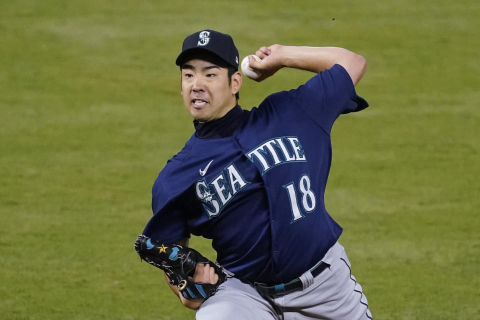 Seattle Mariners starting pitcher Yusei Kikuchi (18) throws during the fifth inning of a baseball game against the Los Angeles Angels Saturday, June 5, 2021, in Anaheim, Calif. (AP Photo/Ashley Landis)