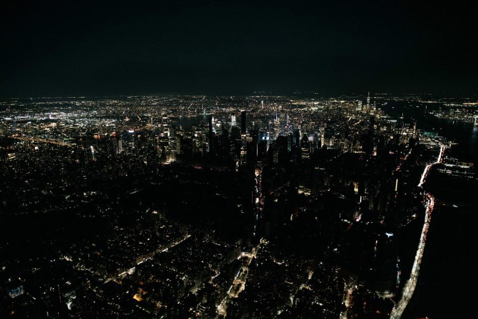 A large section of Manhattan's Upper West Side and Midtown neighbourhoods are seen in darkness during a major power outage (Getty Images)