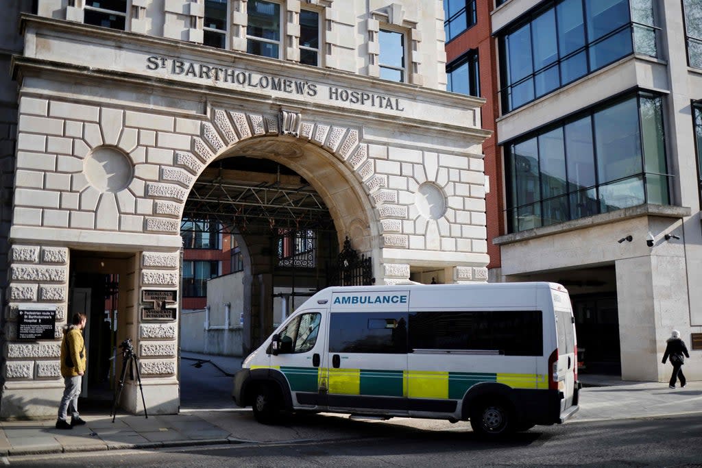 An ambulance arrives at St Bartholomew's Hospital in central London  (AFP via Getty Images)