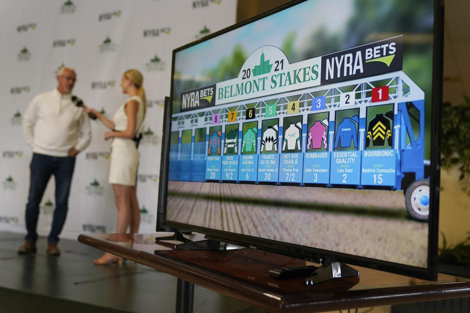 The results of the post-position draw for the 153rd running of the Belmont Stakes horse race are displayed on a screen at Belmont Park in Elmont, N.Y., Tuesday, June 1, 2021. (AP Photo/Seth Wenig)