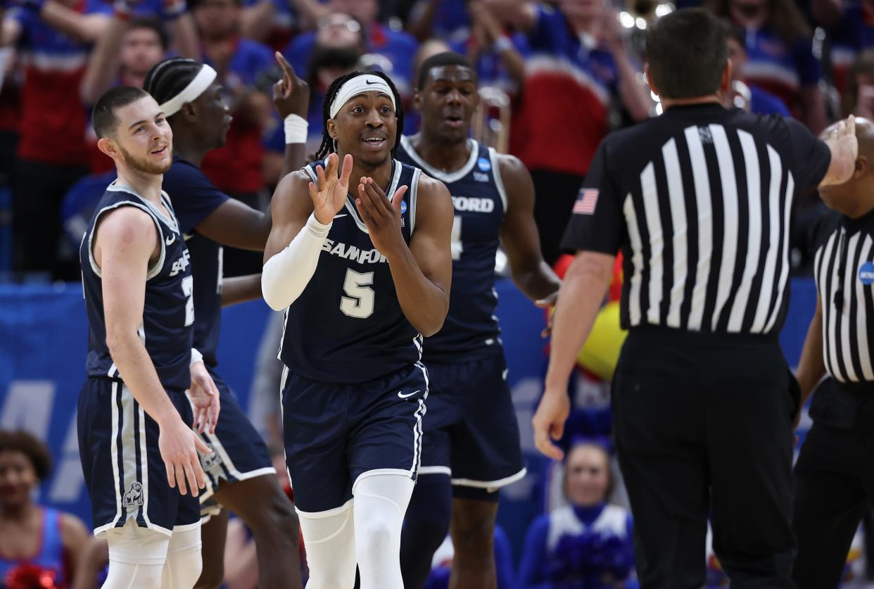 Mar 21, 2024; Salt Lake City, UT, USA; Samford Bulldogs guard A.J. Staton-McCray (5) argues a call during the second half in the first round of the 2024 NCAA Tournament against the Kansas Jayhawks at Vivint Smart Home Arena-Delta Center. Mandatory Credit: Rob Gray-USA TODAY Sports