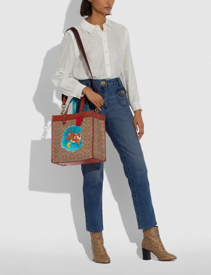 Lunar New Year Field Tote In Signature Canvas With Ox. Image via Coach.