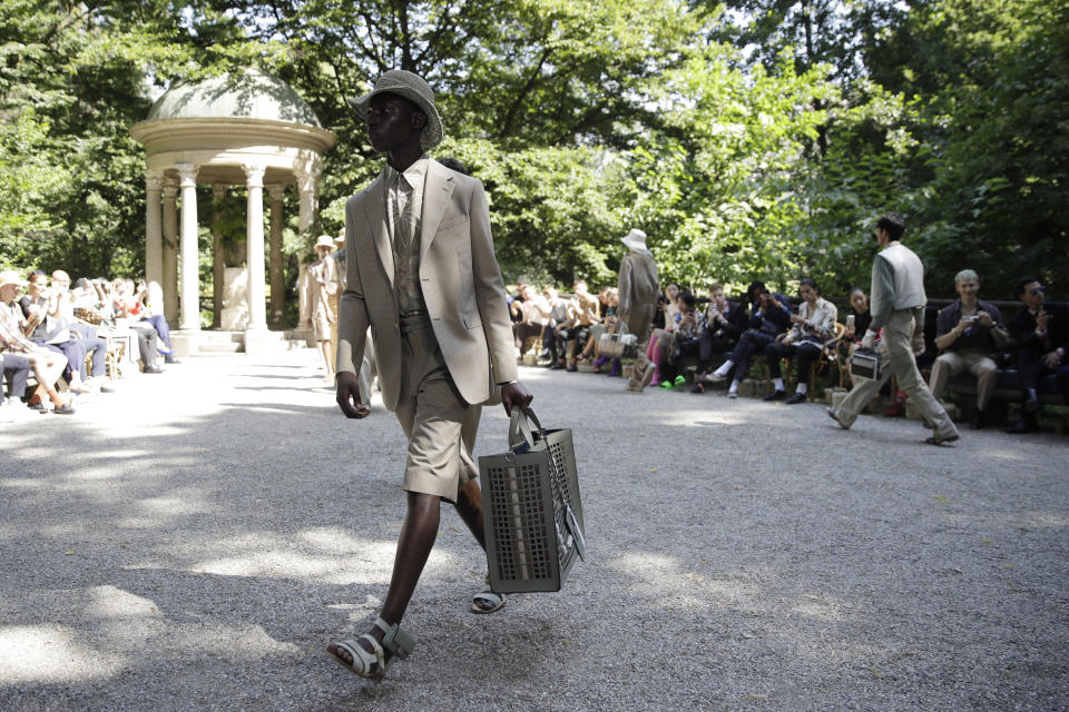 A model wears a creation as part of the Fendi men's Spring-Summer 2020 collection, unveiled during the fashion week, in Milan, Italy, Monday, June 17, 2019. (AP Photo/Luca Bruno)