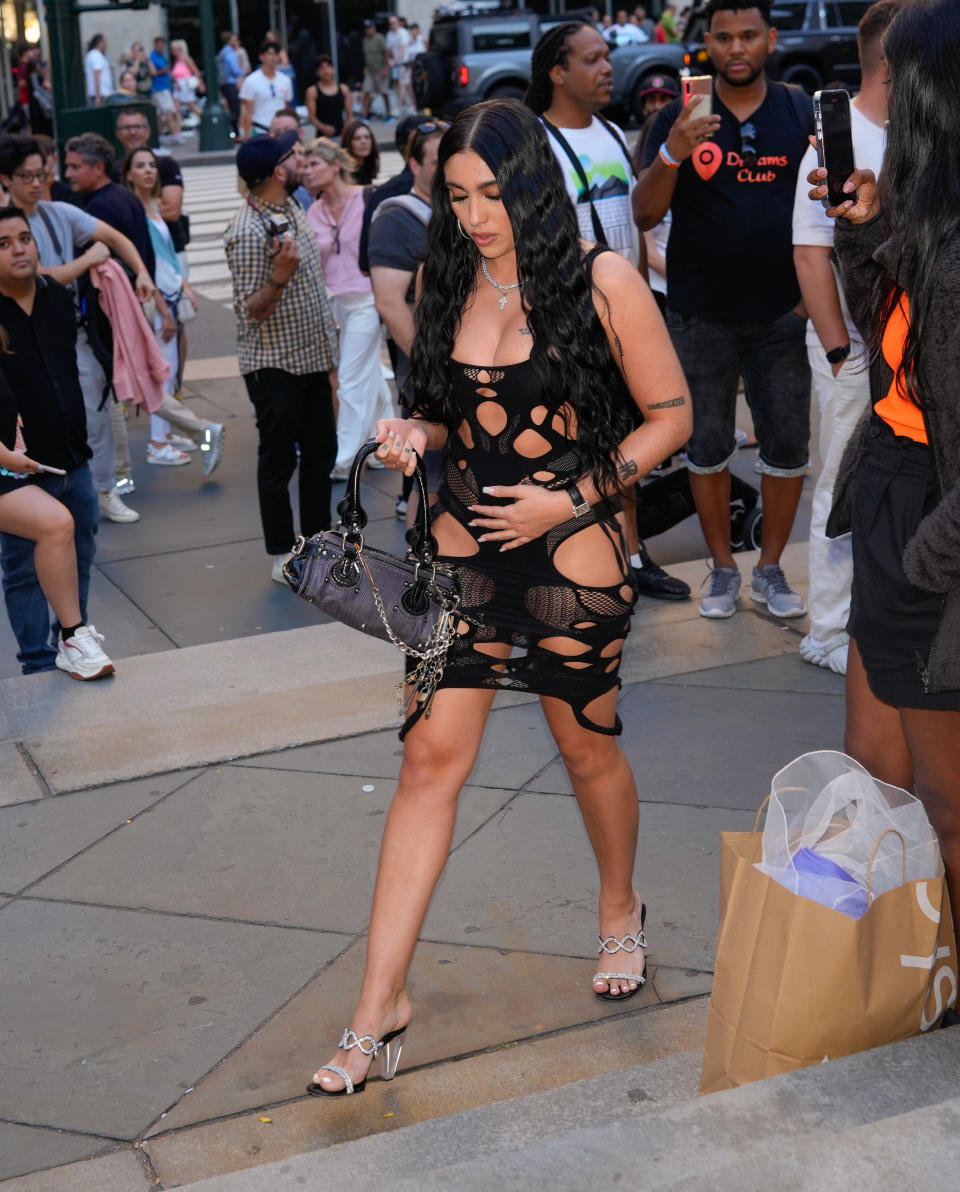 Lourdes Leon attends the Marc Jacobs Fall 2024 Runway at New York Public Library wearing strappy sandals, sparkling shoes, summer shoes, clear heel