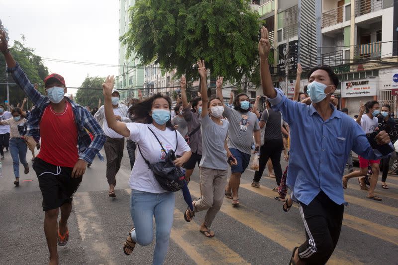 Hundreds of Myanmar activists hold flash mob protest against military rule