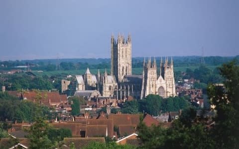 Canterbury Cathedral's spire dominating the skyline - Credit: Dorling Kindersley/Getty Images