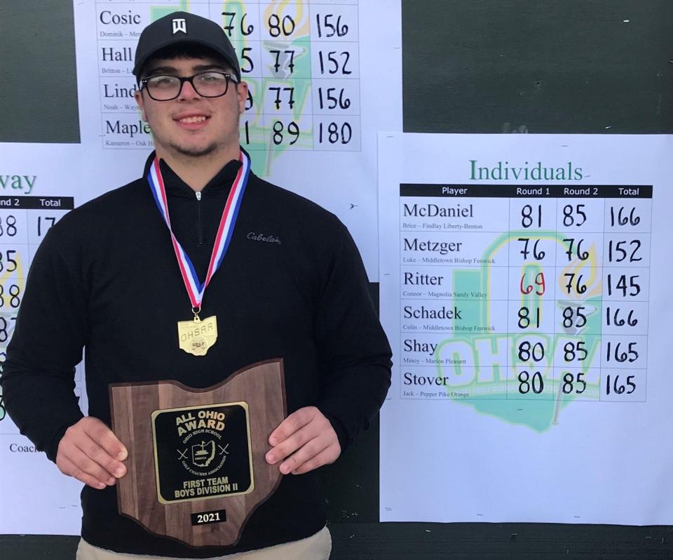 Sandy Valley's Connor Ritter is all smiles after winning the Division II Boys State Golf title.