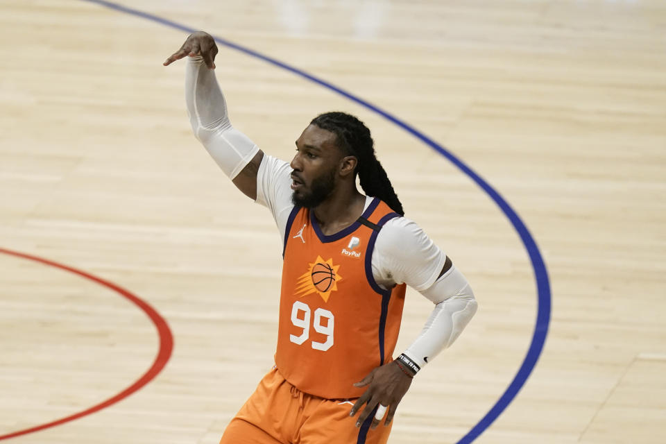 Phoenix Suns' Jae Crowder celebrates his three-point basket during the first half in Game 6 of the NBA basketball Western Conference Finals against the Los Angeles Clippers Wednesday, June 30, 2021, in Los Angeles. (AP Photo/Jae C. Hong)