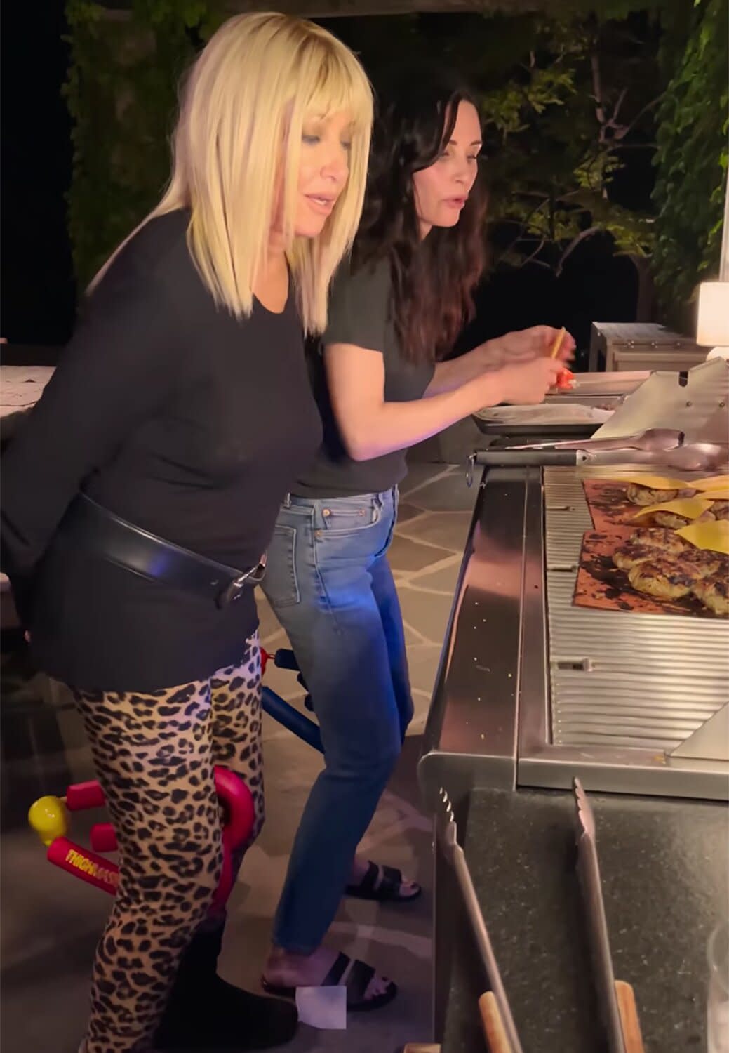 Courteney Cox and Suzanne Somers Make Burgers While Working Out with Thighmasters: 'Cook and Tone'