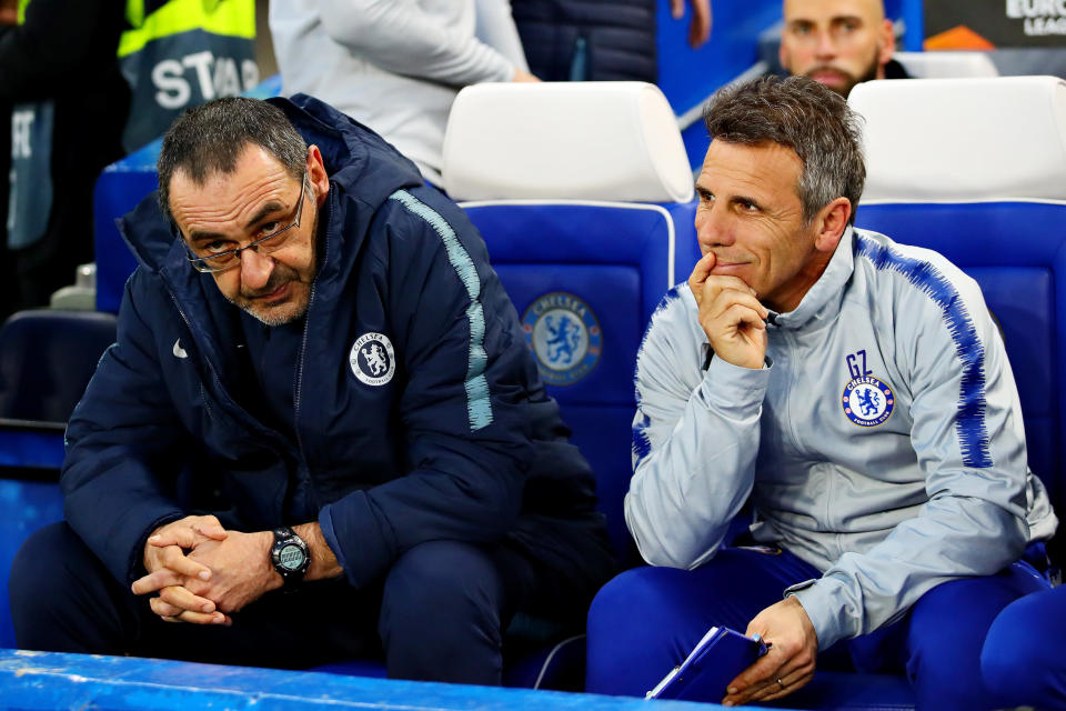 LONDON, ENGLAND - APRIL 18:  Chelsea manager Maurizio Sarri and Assistant manager of Chelsea Gianfranco Zola look on from the dugout during the UEFA Europa League Quarter Final Second Leg match between Chelsea and Slavia Praha at Stamford Bridge on April 18, 2019 in London, England. (Photo by Chris Brunskill/Fantasista/Getty Images)