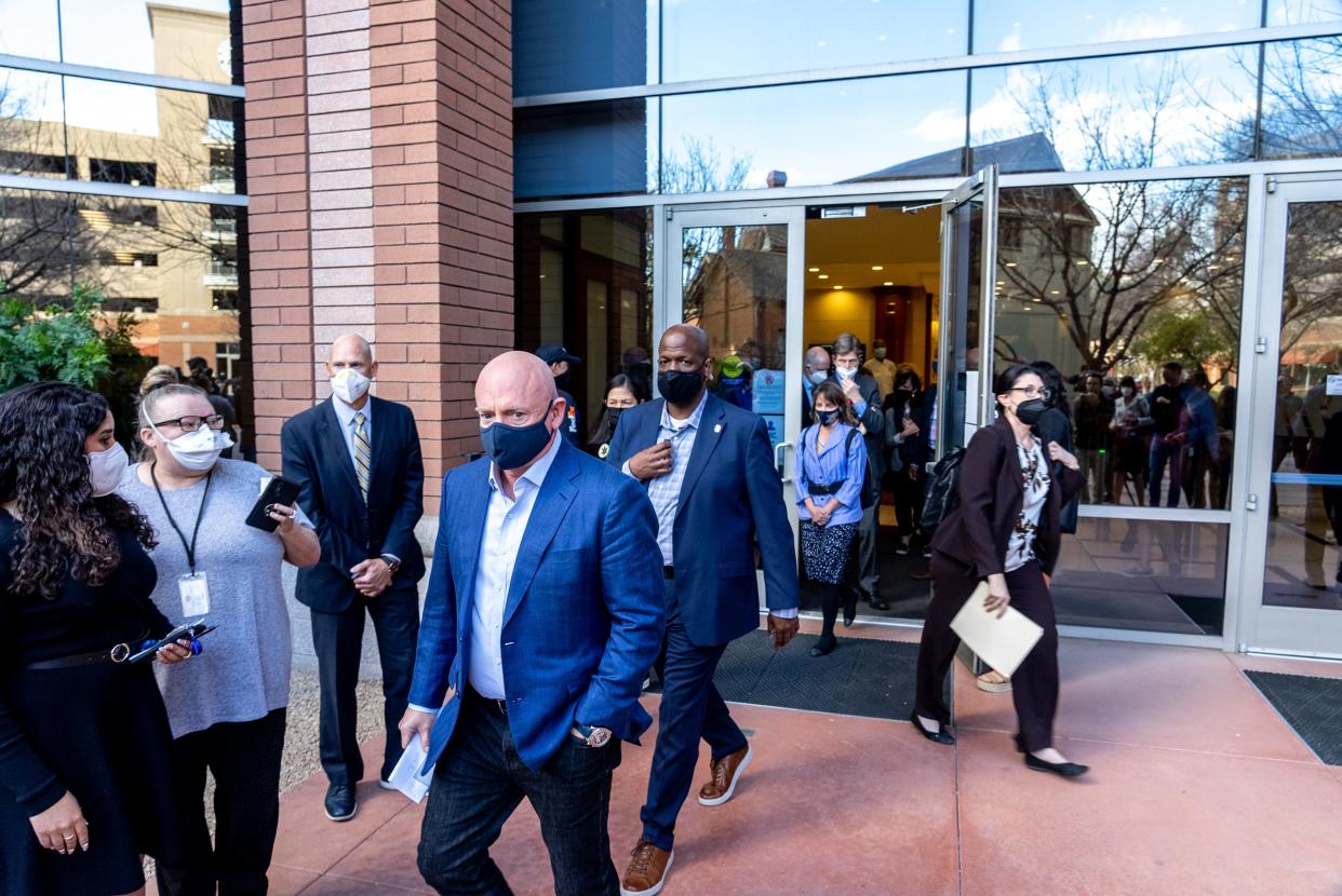 Senator Mark Kelly arrives at a press conference outside the Arizona Department of Water Resources building in Phoenix on February 22, 2022.