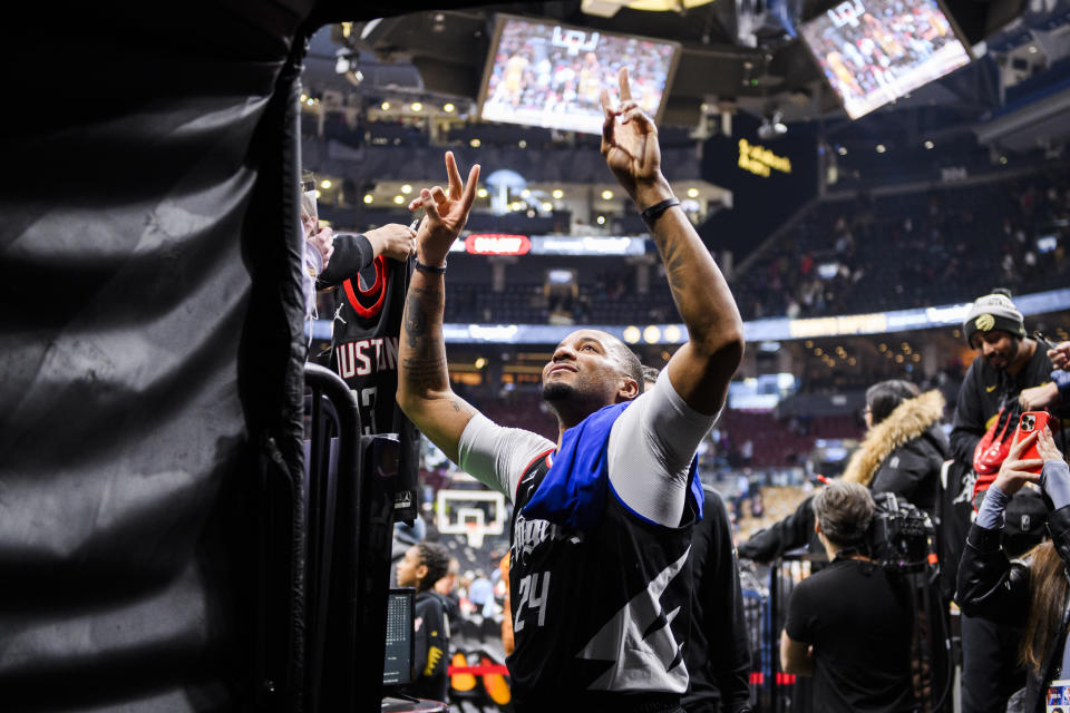 Los Angeles Clippers guard Norman Powell (24) greets fans after his team defeated the Toronto Raptors in an NBA basketball game in Toronto, Friday, Jan. 26, 2024. (Christopher Katsarov/The Canadian Press via AP)