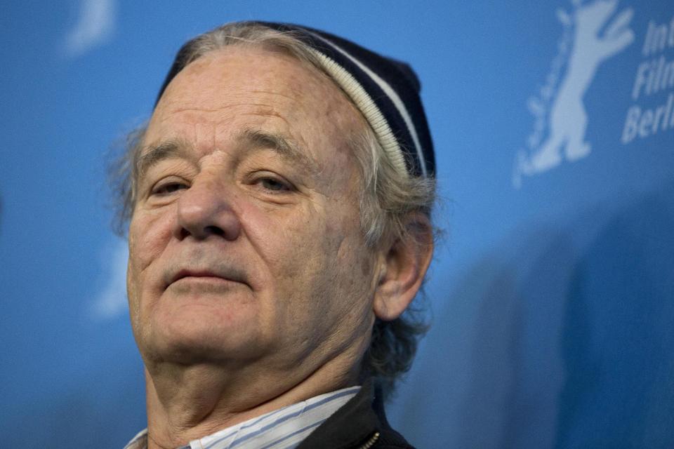 Actor Bill Murray poses for photographers at the photo call for the film The Grand Budapest Hotel during the International Film Festival Berlinale, in Berlin, Thursday, Feb. 6, 2014. (AP Photo/Axel Schmidt)