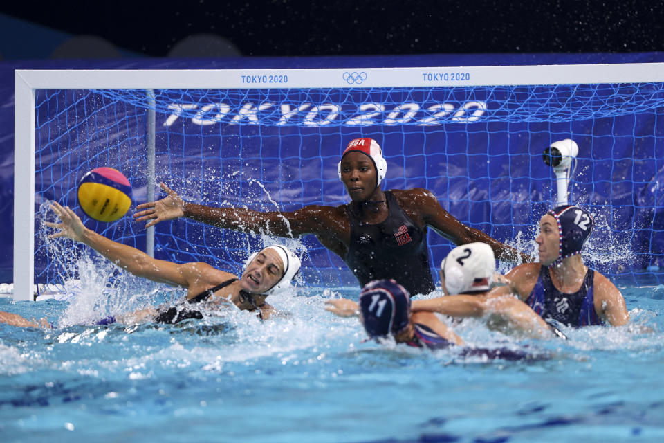 <p>TOKYO, JAPAN - JULY 30: Ashleigh Johnson of Team United States makes a save during the Women's Preliminary Round Group B match between the United States and Team ROC on day seven of the Tokyo 2020 Olympic Games at Tatsumi Water Polo Centre on July 30, 2021 in Tokyo, Japan. (Photo by Harry How/Getty Images)</p> 