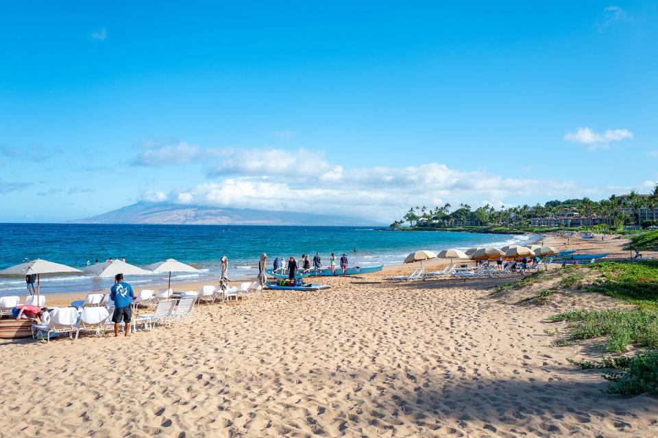 A stretch of Wailea Beach and the Pacific Ocean are visible in front of the Four Seasons Resort Maui at Wailea in Wailea, Hawaii,