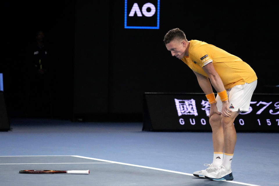 Jiri Lehecka of the Czech Republic reacts after losing a point to Stefanos Tsitsipas of Greece during their quarterfinal match at the Australian Open tennis championship in Melbourne, Australia, Tuesday, Jan. 24, 2023. (AP Photo/Dita Alangkara)