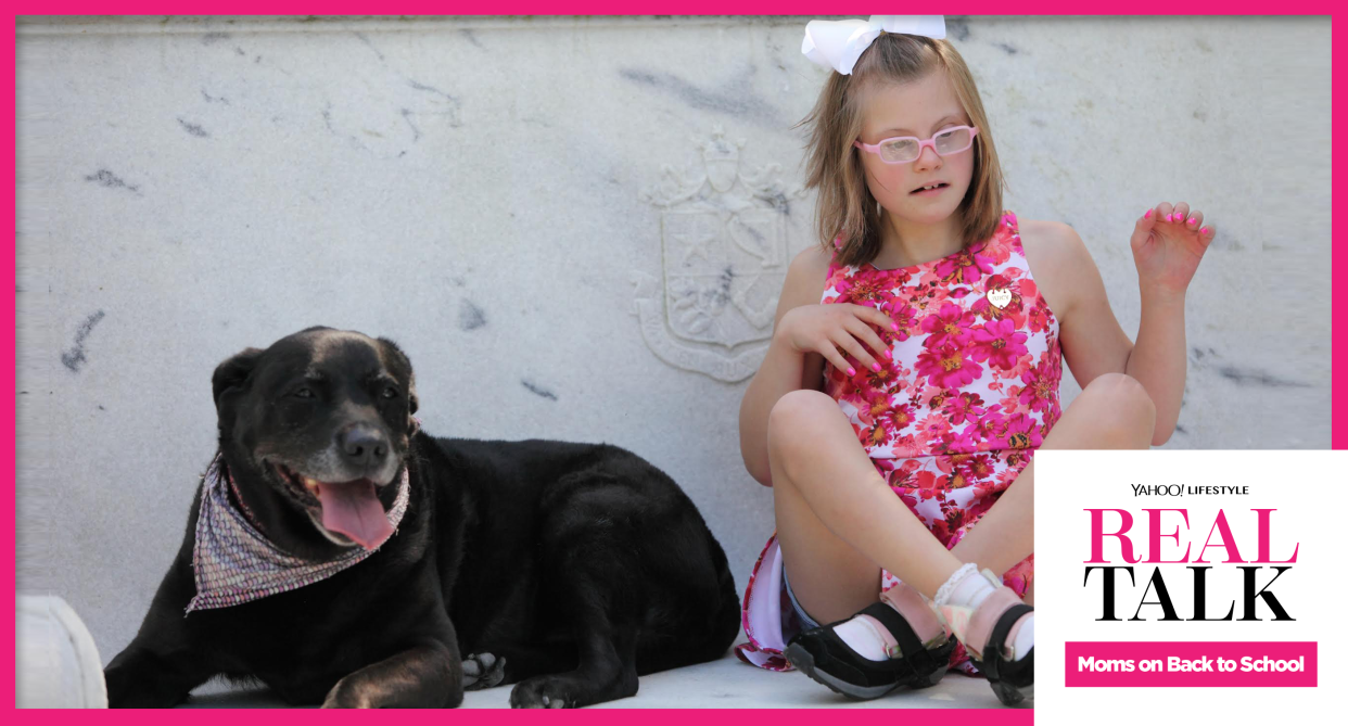 Hallie Levine’s daughter Jo Jo, who has special needs, and the family dog. (Photo: Fatima Barroso)