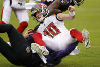 <p>Wide Receiver Adam Humphries #10 of the Tampa Bay Buccaneers is tackled after a reception by free safety Eric Weddle #32 of the Baltimore Ravens at M&T Bank Stadium on December 16, 2018 in Baltimore, Maryland. (Photo by Todd Olszewski/Getty Images) </p>