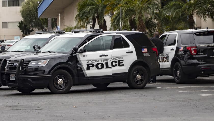 TORRANCE, CA - JANUARY 5, 2019: Torrance police stand guard outside the Gable House Bowl in Torrance