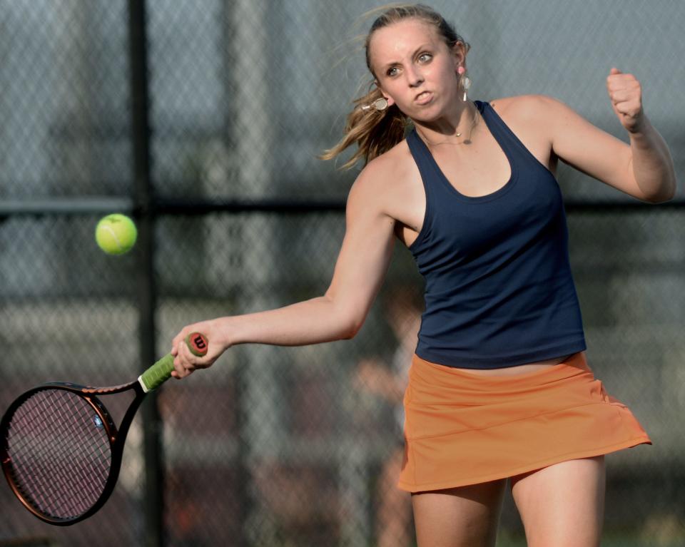 Rochester's Julia Musgrave returns a shot during a doubles match at Chatham Glenwood High School on Wednesday Sept. 11, 2024.