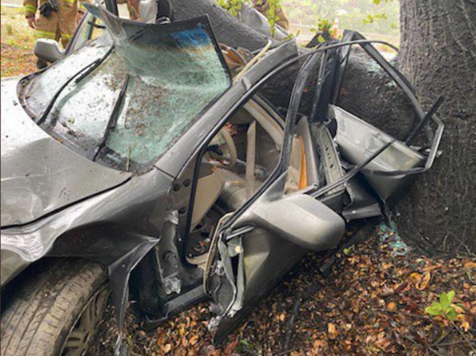 The driver of a Toyota sedan had to be extricated from the wreckage.