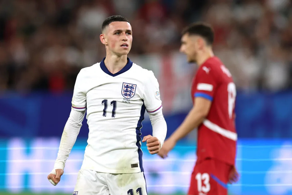 Phil Foden of England celebrates victory following the UEFA EURO 2024 group stage match between Serbia and England at Arena AufSchalke on June 16 in Gelsenkirchen, Germany.