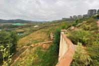 Construction site of a real estate project is seen at the Changyao Mountain on the southeast edge of the Dianchi Lake, in Kunming,