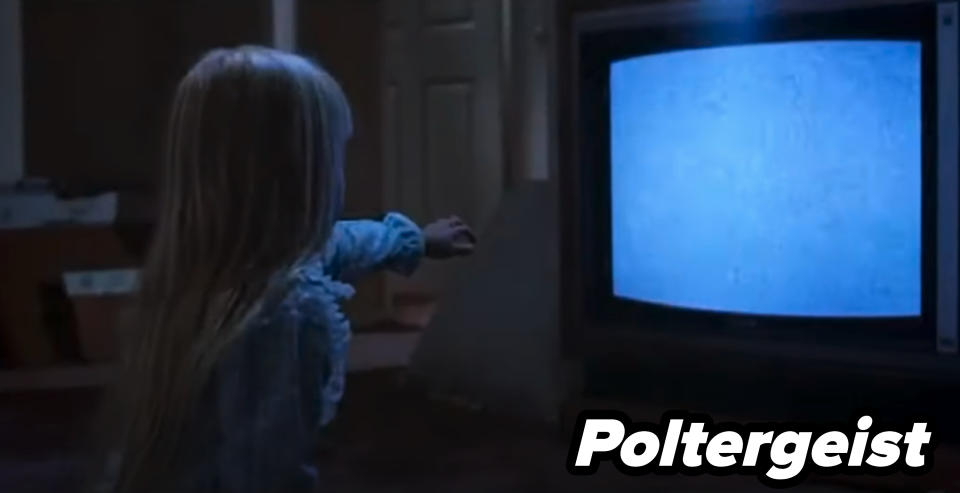 Scene from Poltergeist of little girl watching a staticky TV
